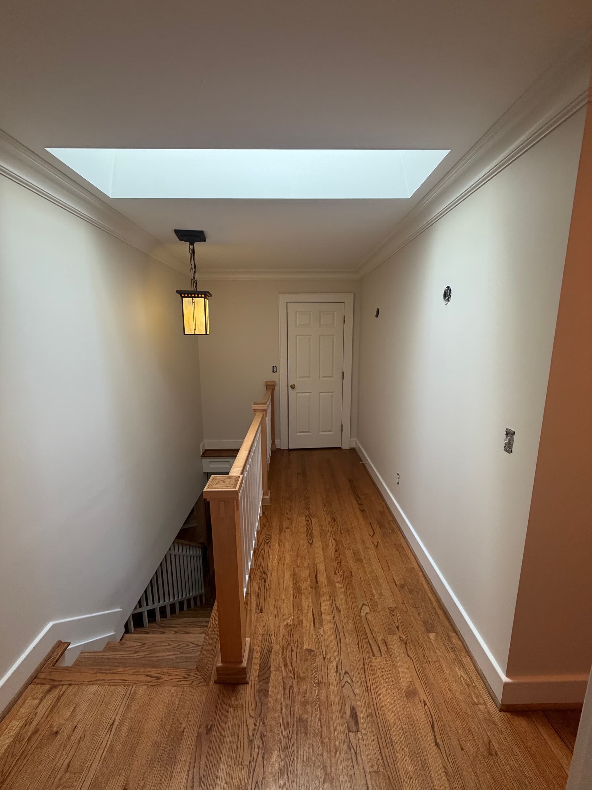 Gallery photos for Upstairs Hallway Goes From Dark and Heavy to Bright and Clean: Image #1